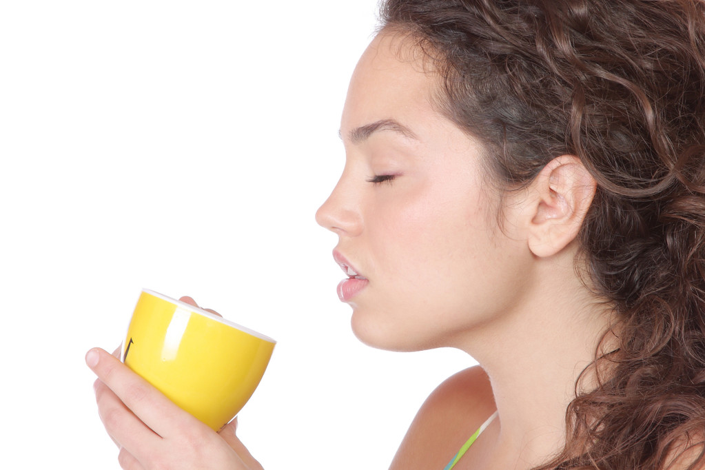 Young woman with a cup - Photo, Image