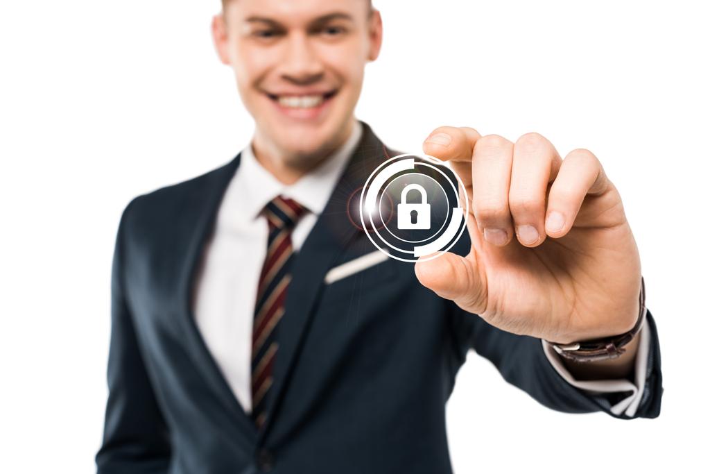 selective focus of happy businessman gesturing and smiling while touching virtual padlock isolated on while  - Photo, Image
