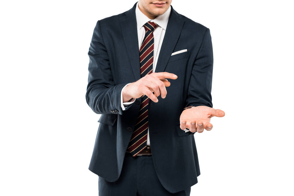 oříznutý pohled člověka v obleku a s prstem na ruce izolovaný na bílém  - Fotografie, Obrázek