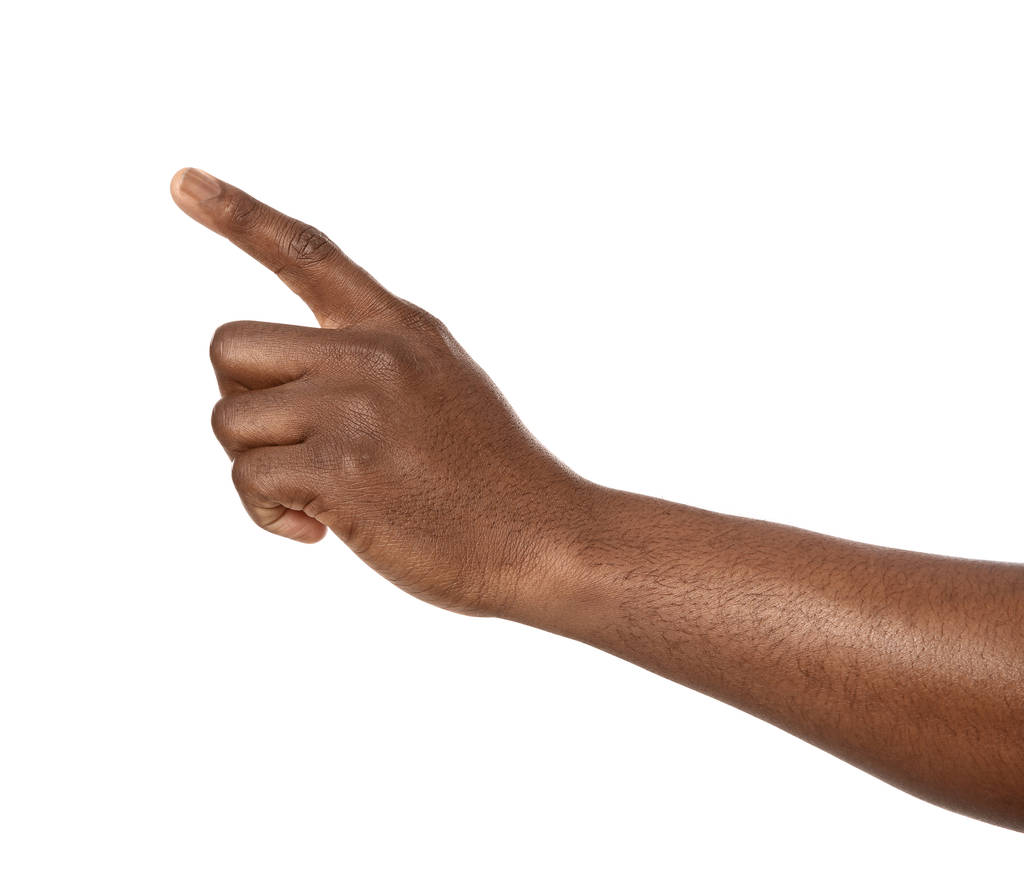 Afrikkalais-amerikkalainen mies osoittaa jotain valkoisella taustalla, lähikuva
 - Valokuva, kuva