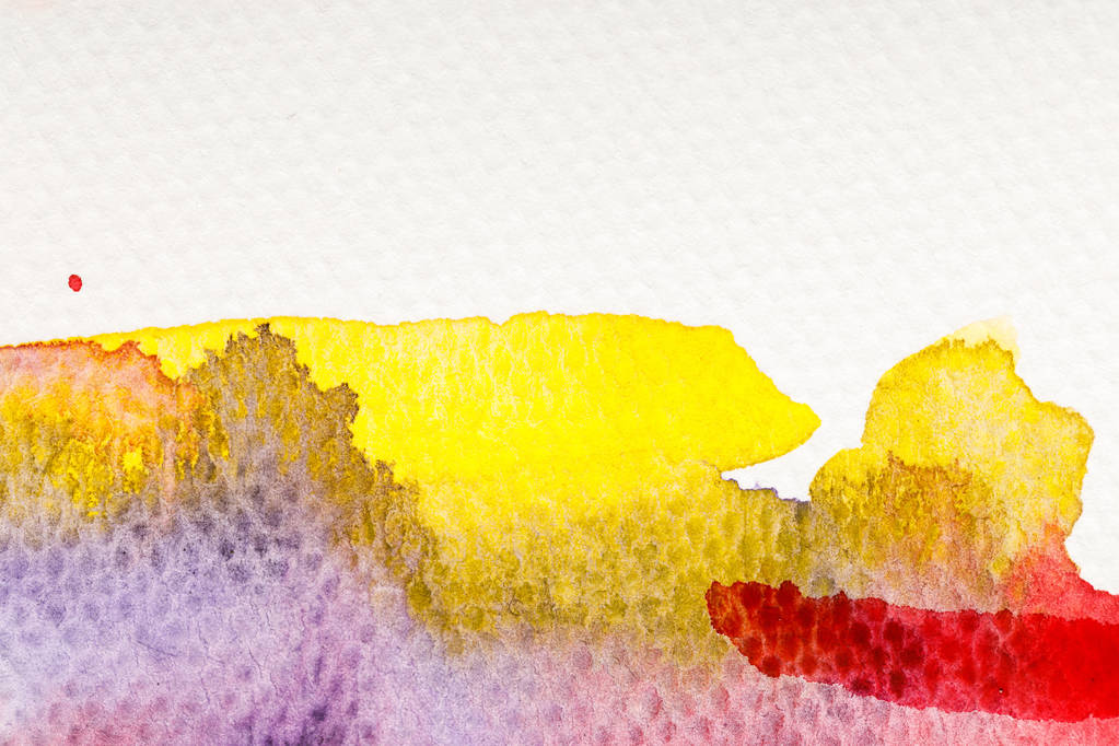 close up view of yellow, purple and red watercolor paint spills on white background with copy space - Photo, Image