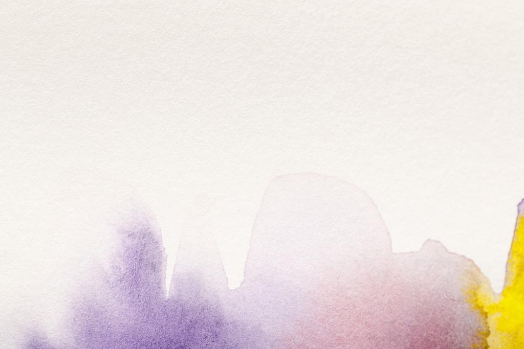 close up view of yellow, purple watercolor paint spills  - Photo, Image
