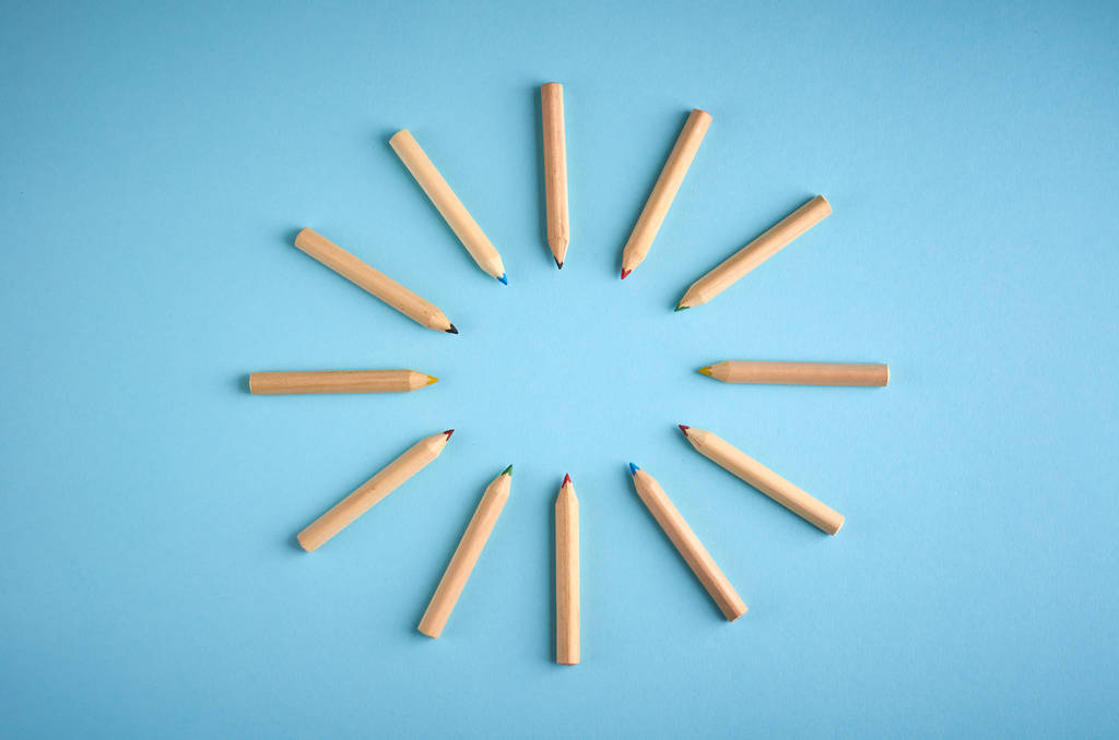 Wooden color pencils on blue background, flat lay - Photo, Image