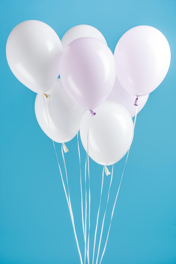 decorative white party balloons on blue background - Photo, Image