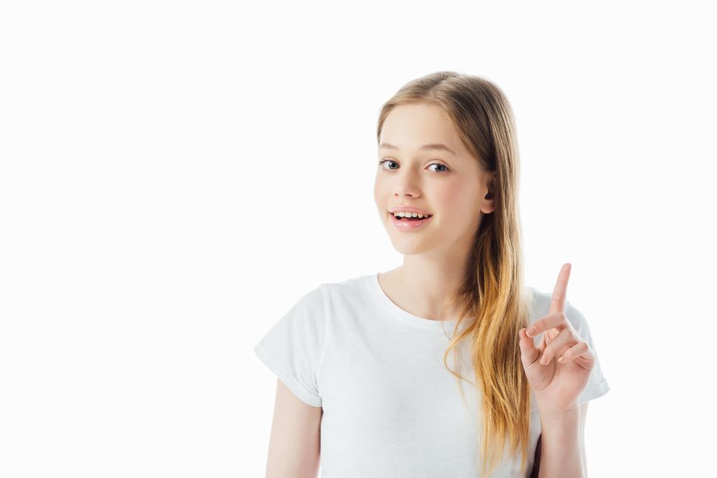 happy teenage girl showing idea gesture and looking at camera isolated on white - Photo, Image