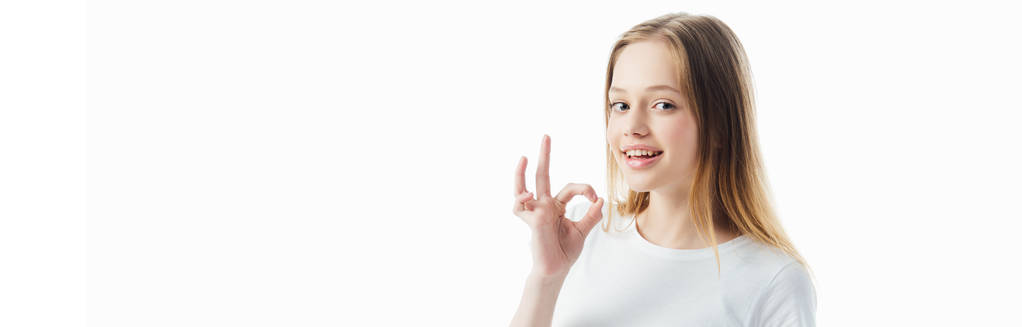 happy teenage girl showing ok sign isolated on white, panoramic shot - Photo, Image