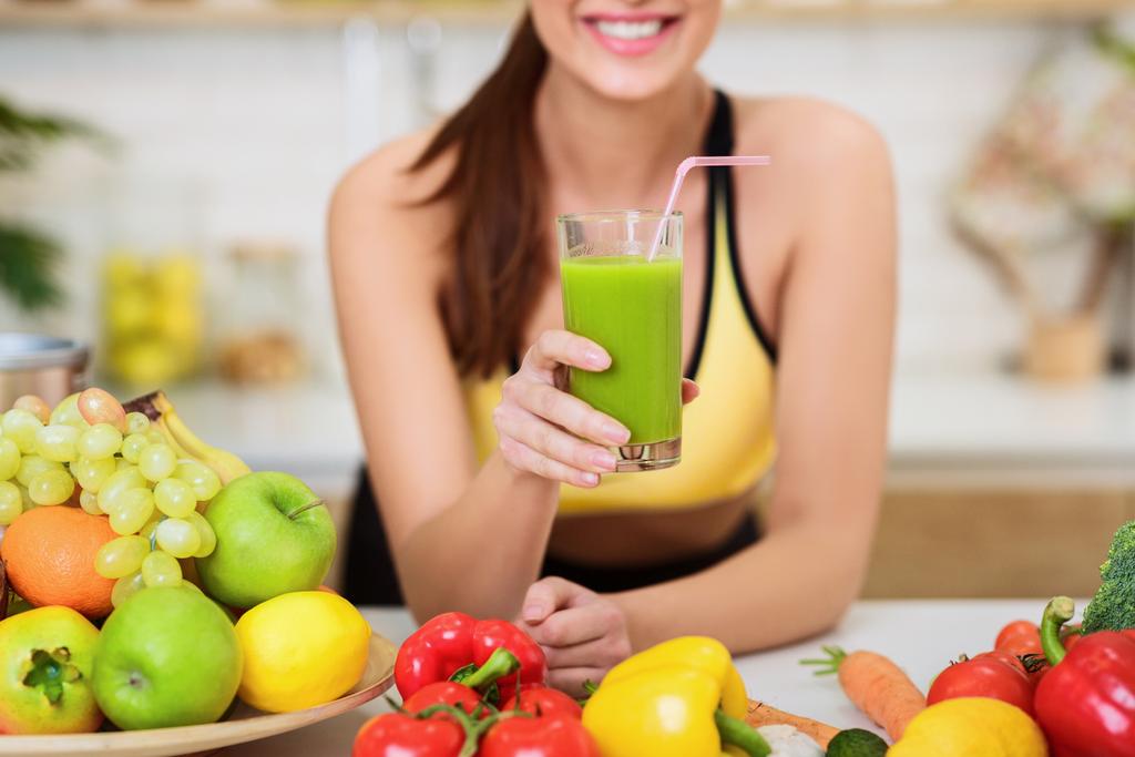 Happy Woman Drinking Fresh Green Detox Vegetable Juice - Photo, Image