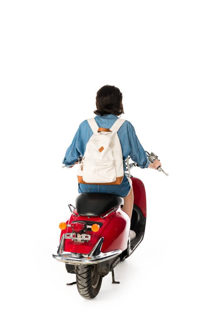 vista trasera de chica en scooter rojo aislado en blanco
 - Foto, imagen