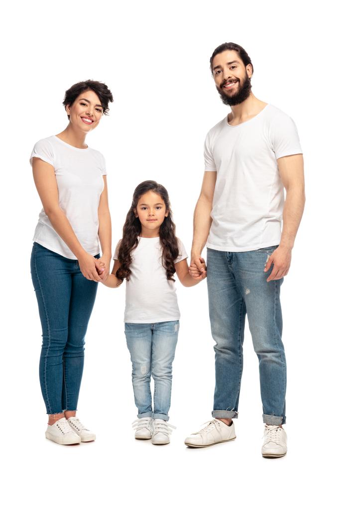 Latijnse ouders houden van handen met schattige dochter geïsoleerd op wit  - Foto, afbeelding