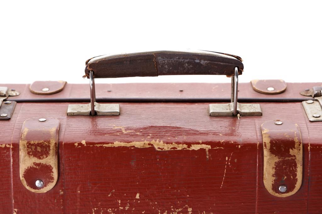 close up view of handle on vintage brown suitcase isolated on white - Photo, Image