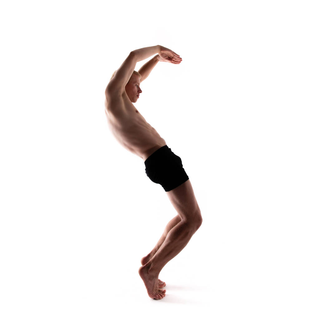 Alfabeto yoga. La lettera S formata dal corpo dello yogi
 - Foto, immagini