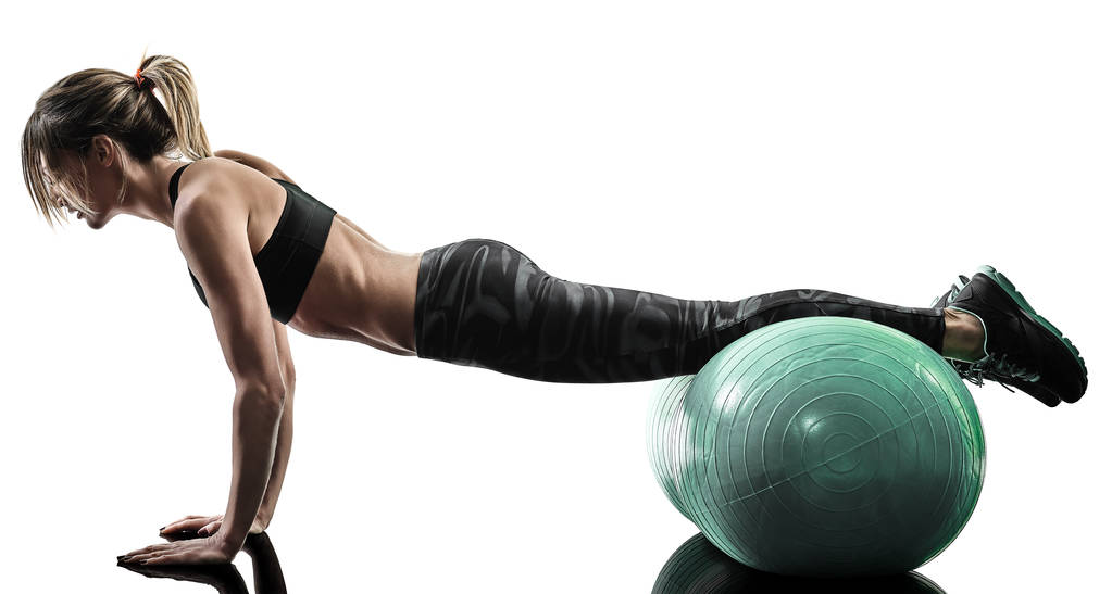 жінка пілатес фітнес-свінг м'яч вправи силует ізольовані
 - Фото, зображення