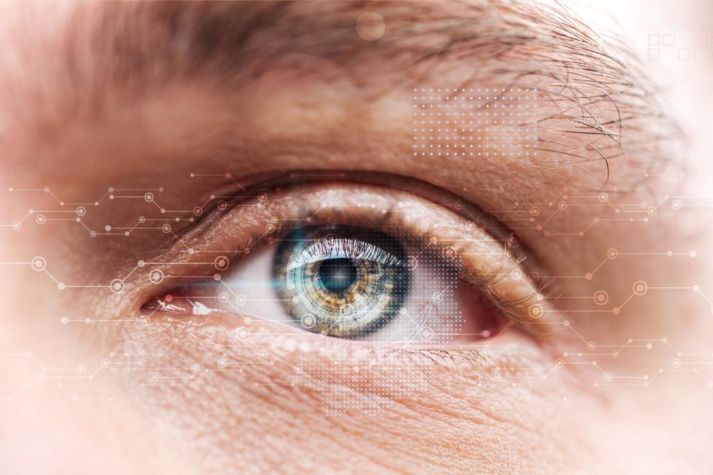 close up view of mature man eye with data illustration, robotic concept - Photo, Image