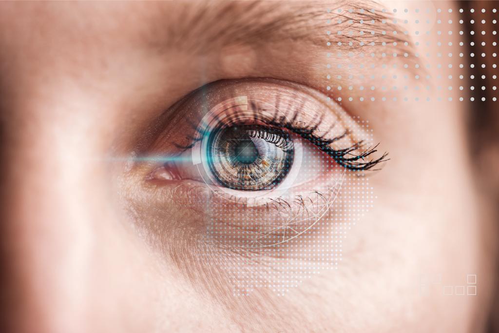 close up view of human eye with data illustration, robotic concept - Photo, Image
