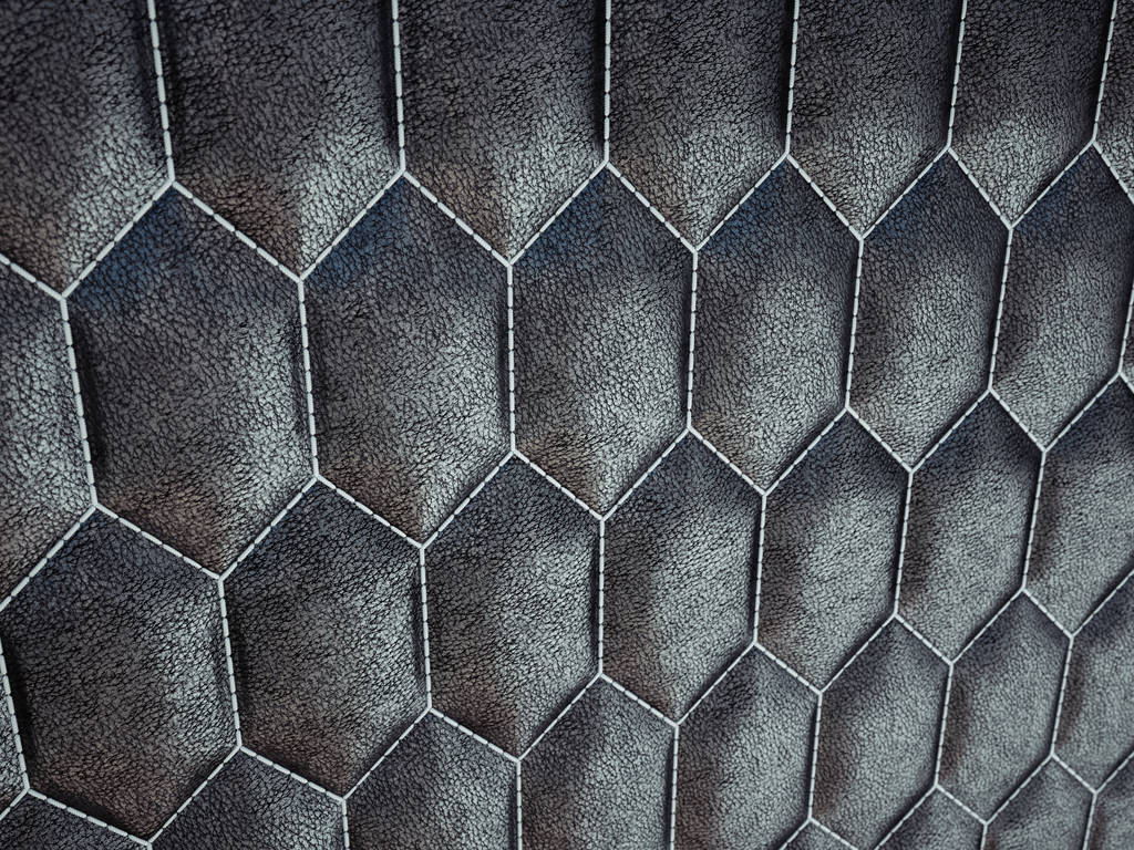 Кожаный сшитый шестиугольник или гомекомб черная блестящая текстура
  - Фото, изображение