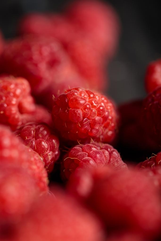 selective focus of delicious fresh bright ripe raspberries - Photo, Image
