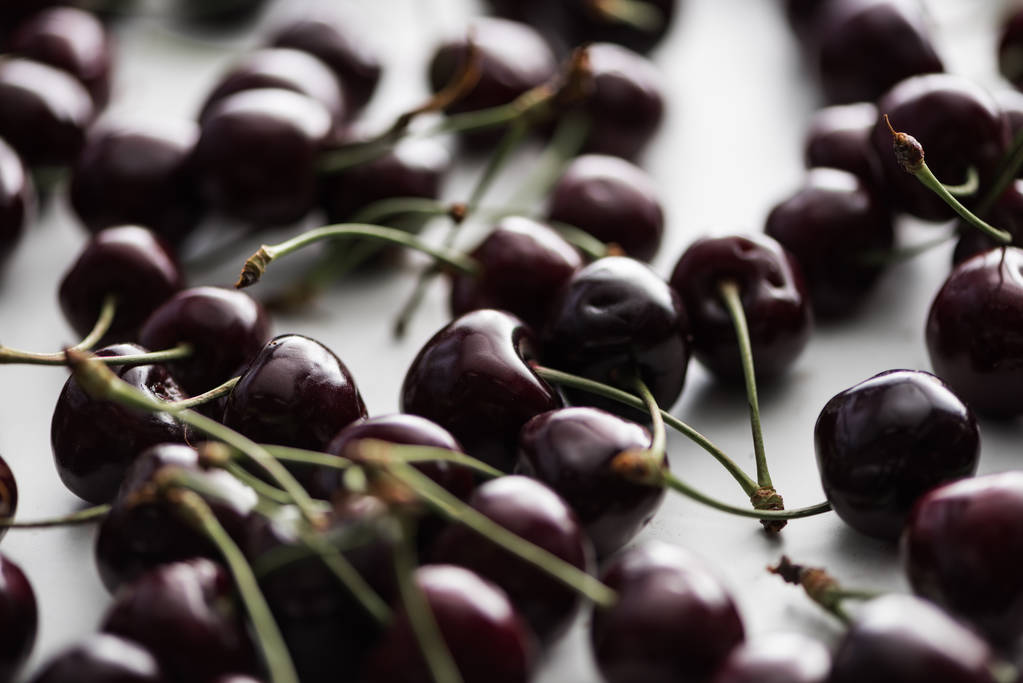 selective focus of ripe, fresh, whole and sweet cherries - Photo, Image