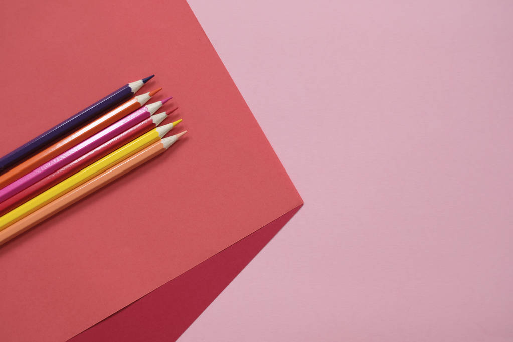 Abstract geometric paper background with color pencils. School and education concept. - Photo, Image