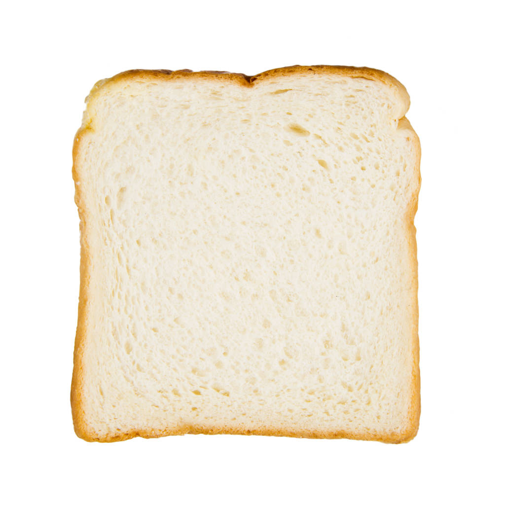 Detailní obrázek jeden plátek bílého chleba proti bílé bac - Fotografie, Obrázek