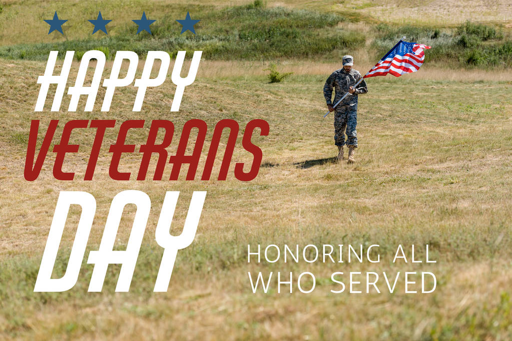 красивий солдат у формі ходьби і тримає американський прапор в літній час з днем ветеранів, вшановуючи всіх, хто служив ілюстрації
 - Фото, зображення