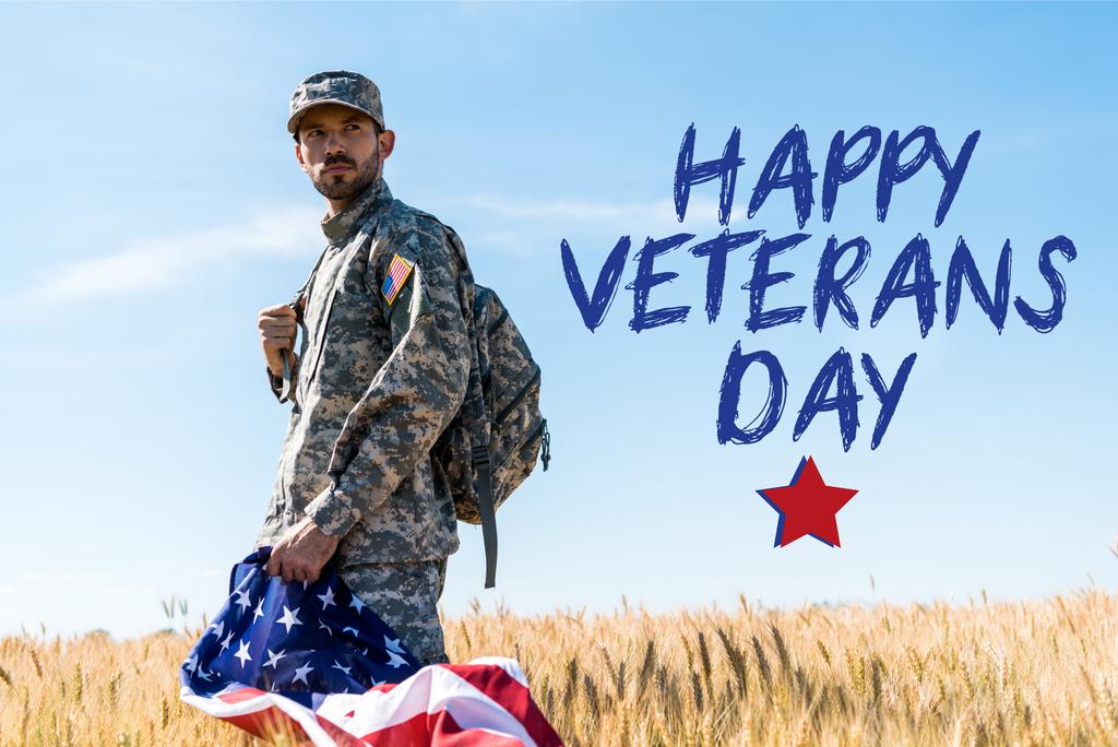 солдат у формі тримає американський прапор, стоячи в полі з щасливими ілюстраціями дня ветеранів
 - Фото, зображення
