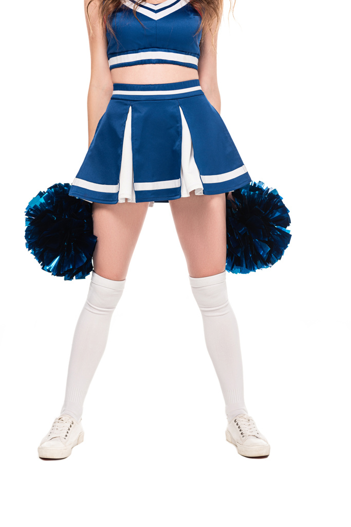partial view of cheerleader girl in blue skirt and gaiters holding pompoms isolated on white - Photo, Image