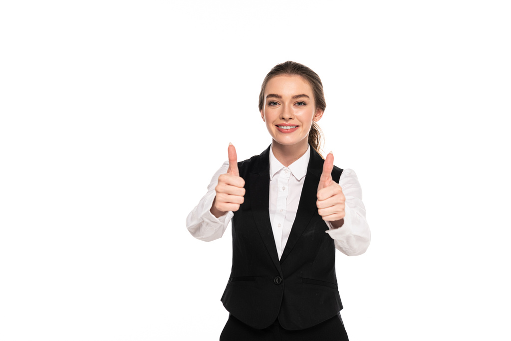Szczęśliwa młoda kelnerka pokazując kciuki na białym tle - Zdjęcie, obraz