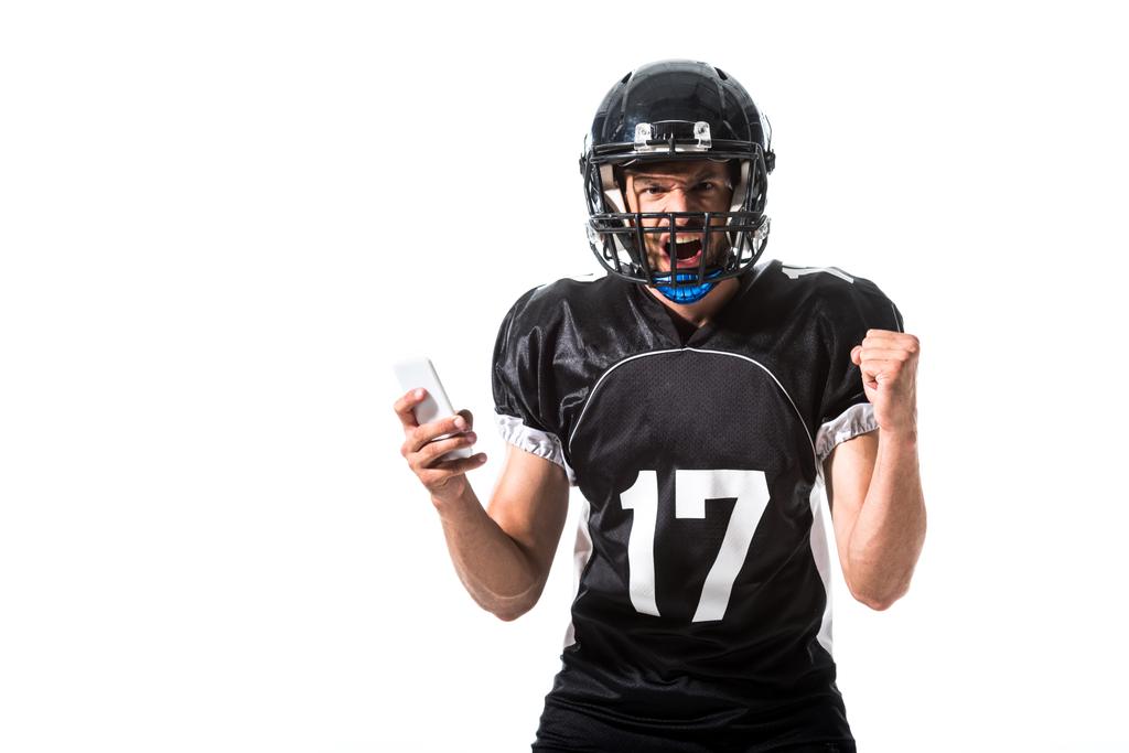 kiabálás amerikai futball játékos okostelefon és összeszíkolt kézzel izolált fehér - Fotó, kép