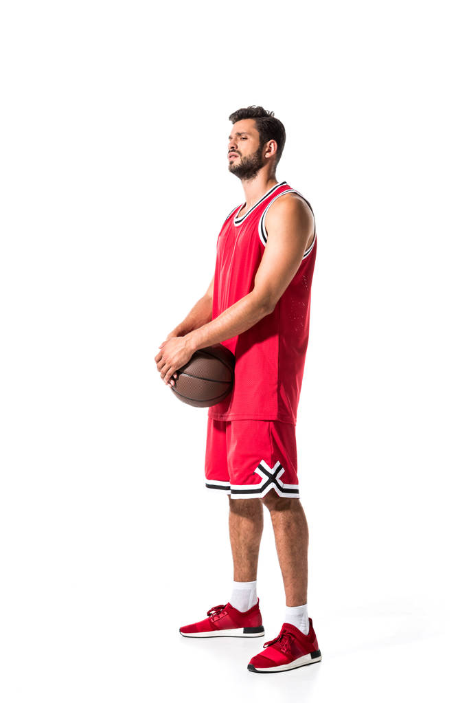 basketbol oyuncusu uzak Izole beyaz üzerinde  - Fotoğraf, Görsel