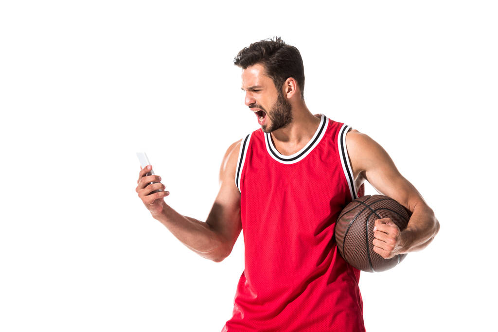 kosárlabda-lejátszó segítségével okostelefon és sikoltozik elszigetelt fehér  - Fotó, kép