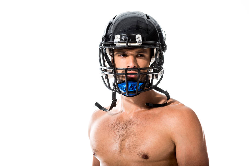 白に隔離されたヘルメットのシャツレスアメリカンフットボール選手 - 写真・画像