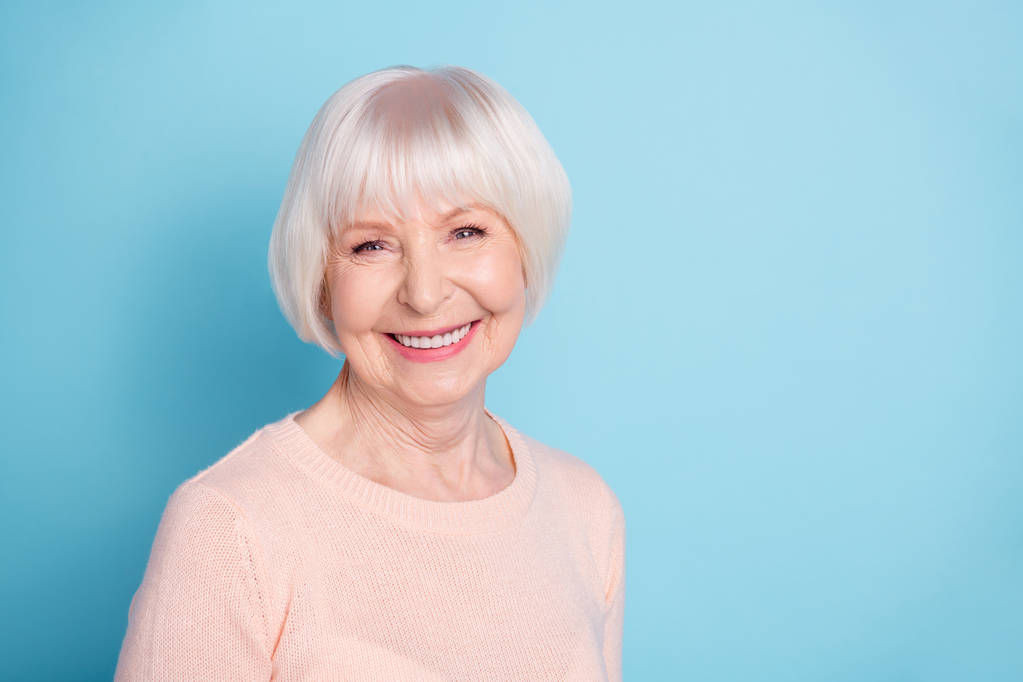 Close-up portrait of her she nice-looking attractive lovely kind healthy well-groomed cheerful cheery glad gray-haired lady enjoying spring isolated over bright vivid shine blue green teal background - Photo, Image