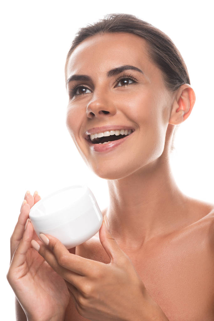 jeune femme nue tenant crème cosmétique et riant isolé sur blanc
 - Photo, image