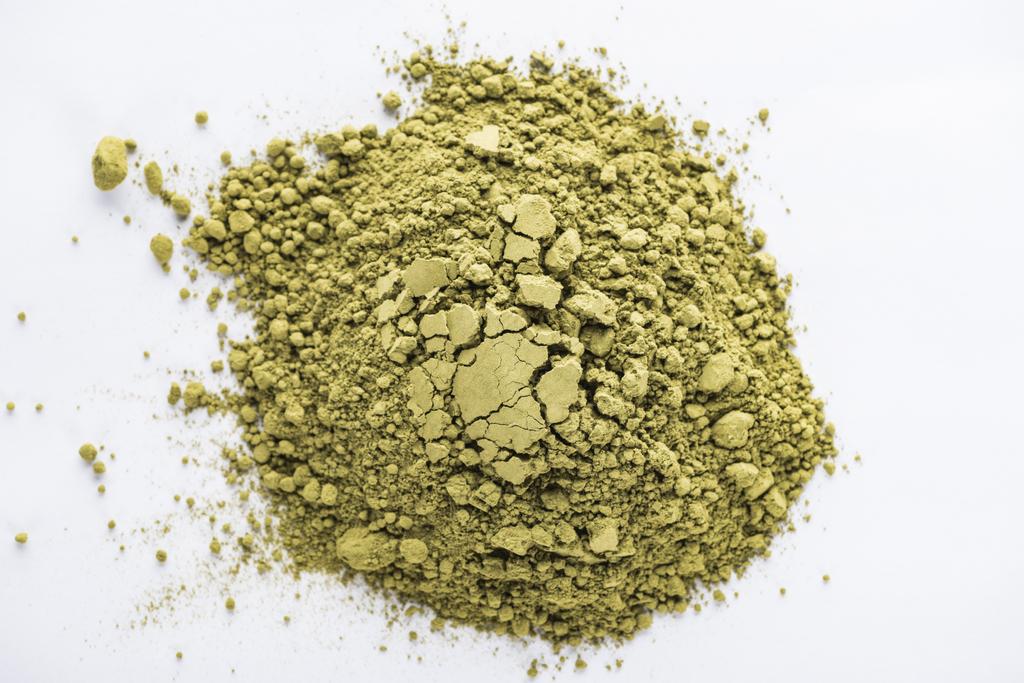 top view of green matcha tea powder on white table  - Photo, Image