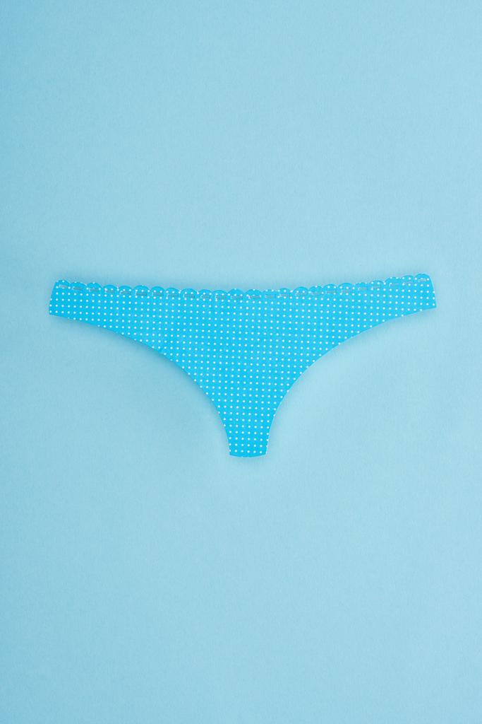 top view of paper cut panties isolated on beige - Photo, Image