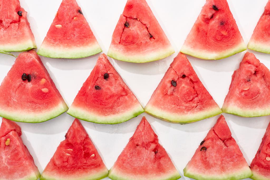 flat lay with juicy watermelon slices on white background - Photo, Image