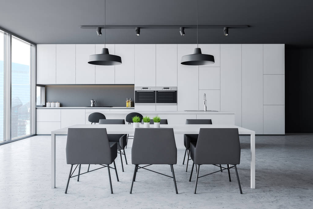 Cocina panorámica gris con mesa
 - Foto, imagen