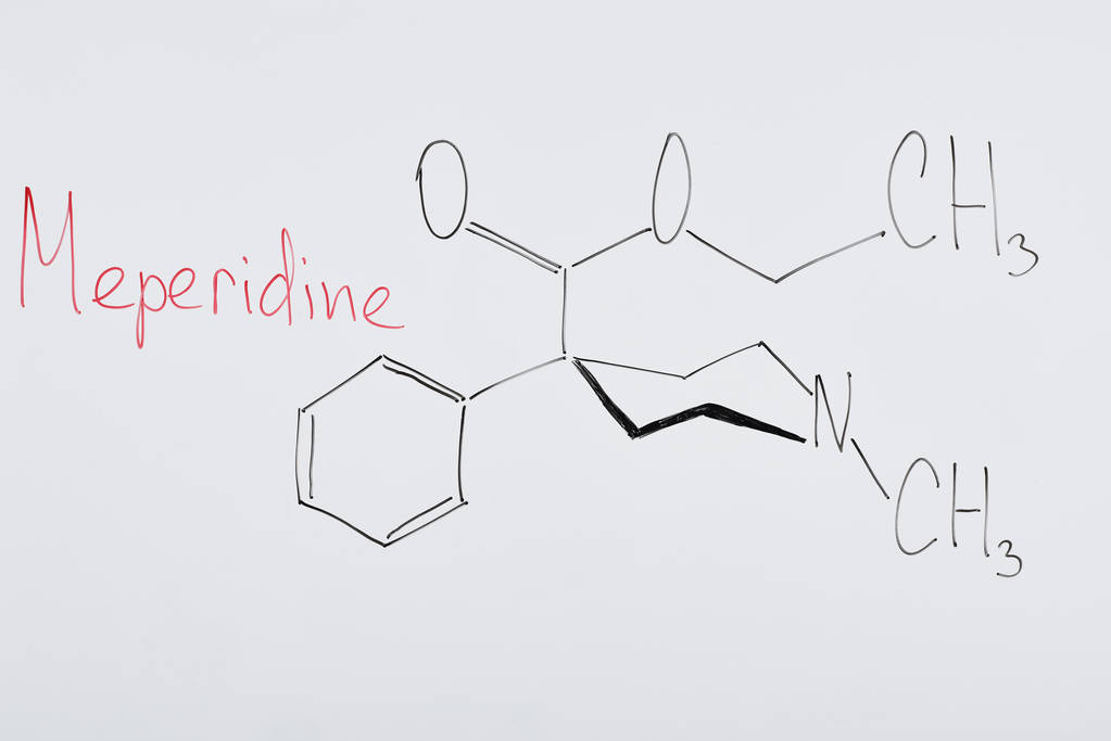 вид зверху на білу дошку з хімічною формулою і написанням медідину
 - Фото, зображення