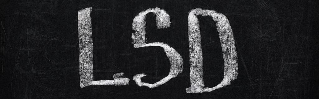panoramic shot of black chalk board with lettering lsd  - Photo, Image