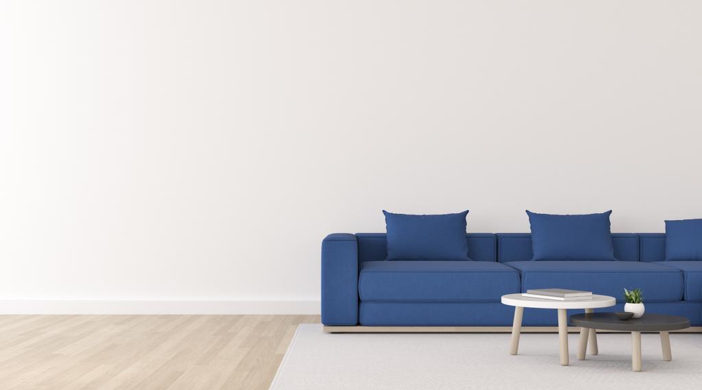 Blick auf weißes Wohnzimmer im minimalistischen Stil mit dunkelblauem Stoffsofa und kleinem Beistelltisch auf Holzlaminatboden. Perspektive skandinavischen Interieurs mit Hängelampen-Design. 3D-Darstellung. - Foto, Bild