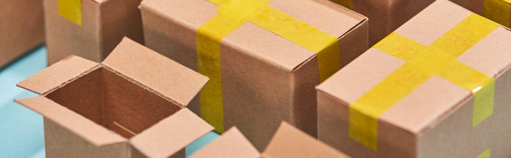 panoramic view of miniature postal boxes with yellow adhesive tape - Photo, Image