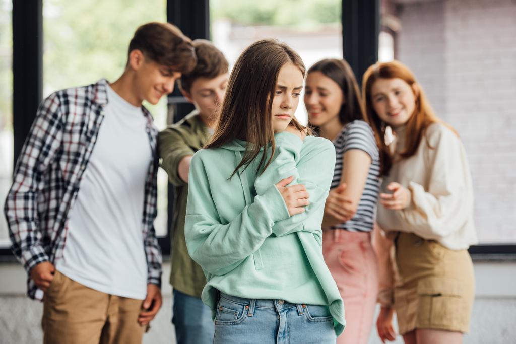 panoramic shot of group of teenagers bullying girl - Photo, Image