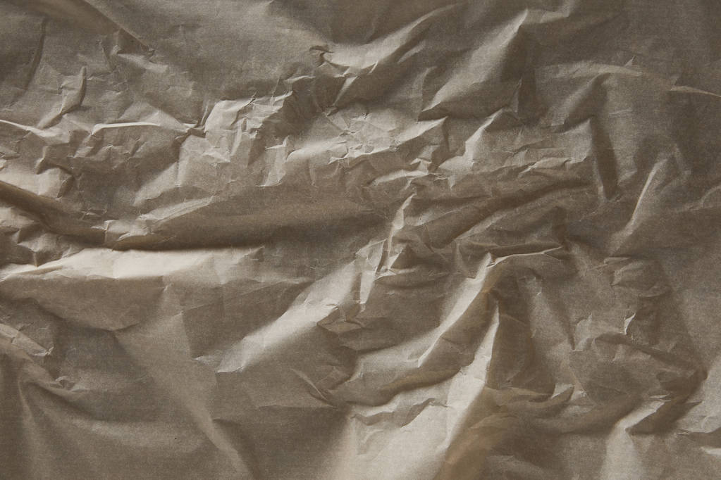top view of beige wrinkled parchment paper surface with copy space - Photo, Image