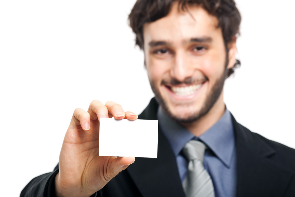 Empresário sorridente mostrando um cartão em branco
 - Foto, Imagem