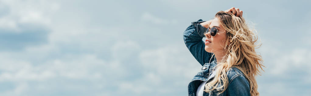 panoramic shot of attractive woman in denim jacket looking away  - Photo, Image