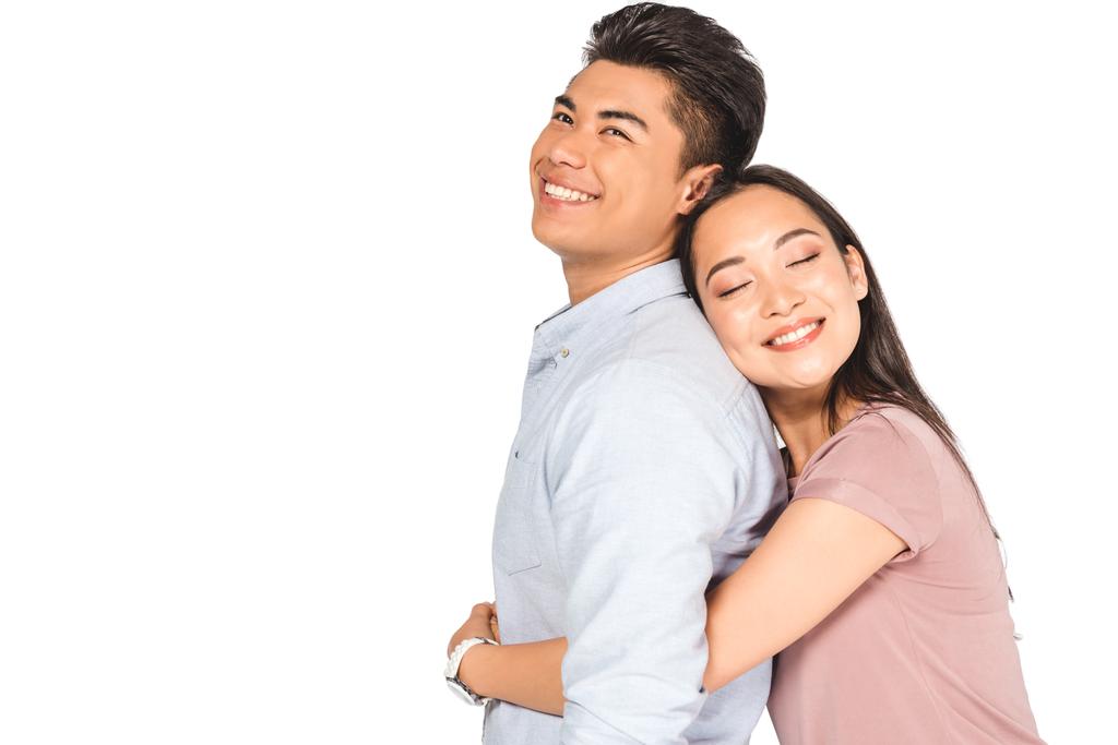 feliz asiático mujer abrazando guapo asiático novio aislado en blanco
 - Foto, Imagen