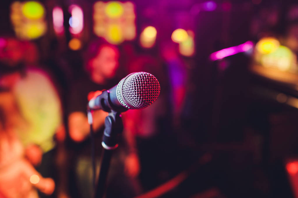 Microphone. Microphone close-up. A pub. Bar. A restaurant. Classical music. Music. - Photo, Image