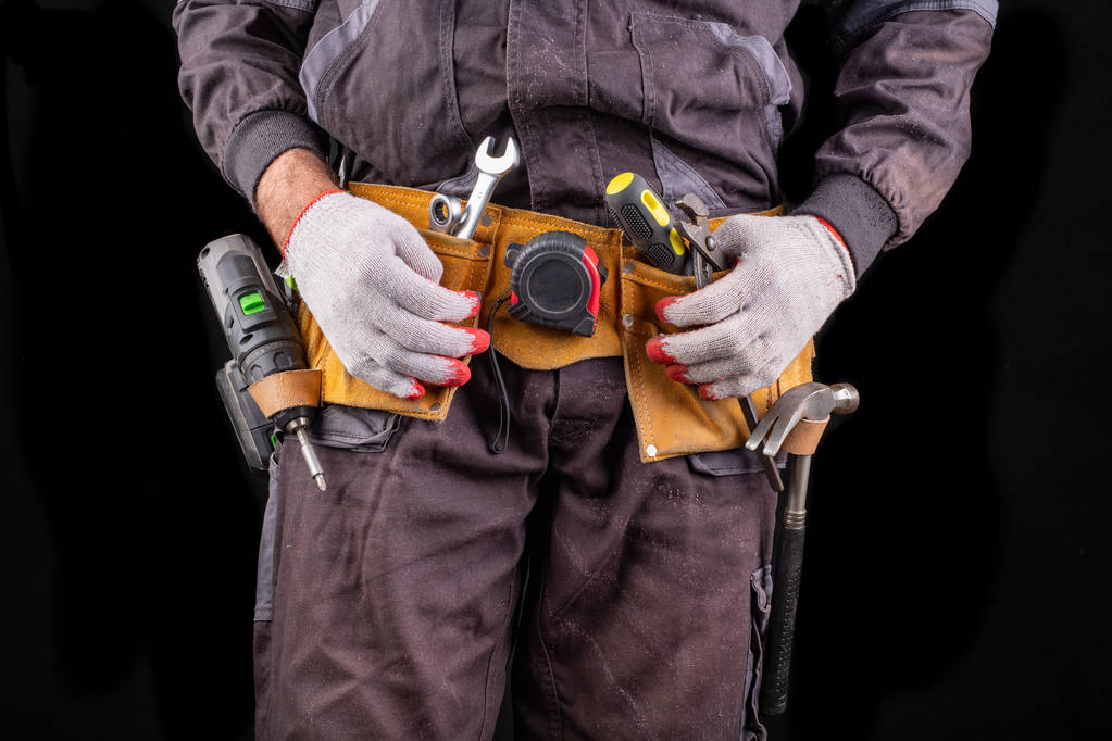 Production worker with tool belt. - Photo, Image