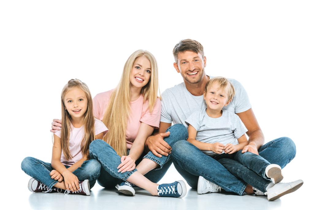 cheerful kids sitting with happy parents on white  - Photo, Image