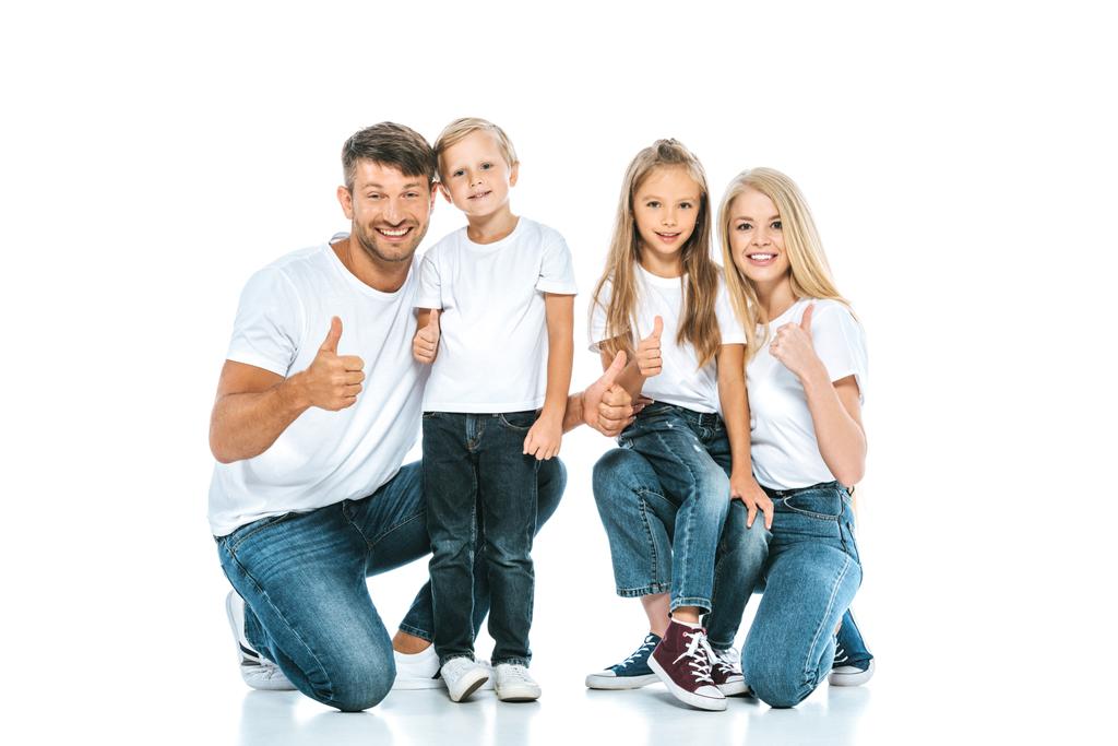 heureux parents et les enfants montrant pouces sur blanc
  - Photo, image